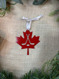 Maple Leaf with Hockey Sticks Metal Ornament